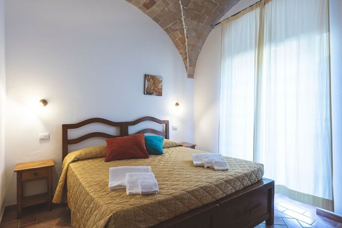 Imagen de la habitación del Resort Le Tegole. Foto 20