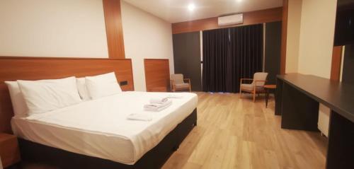 Imagen de la habitación del Restway Hotel. Foto 13