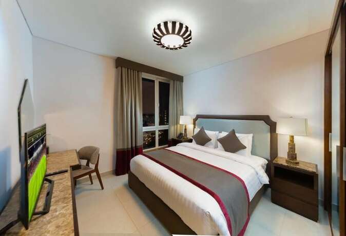 Imagen de la habitación del Retaj Baywalk Residence. Foto 18