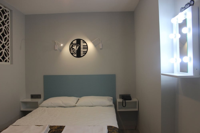 Imagen de la habitación del Retro Star Suites. Foto 11