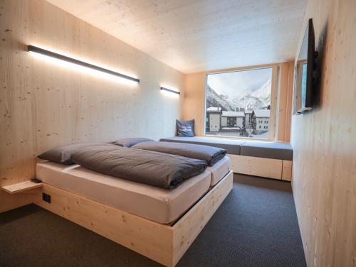 Imagen de la habitación del Revier Mountain Lodge Saas-Fee. Foto 13