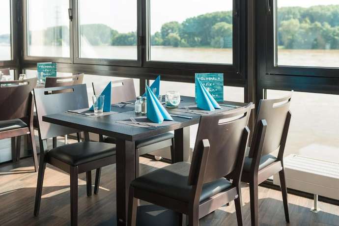 Imagen del bar/restaurante del Rheinterrassen Hotel Café Restaurant. Foto 5