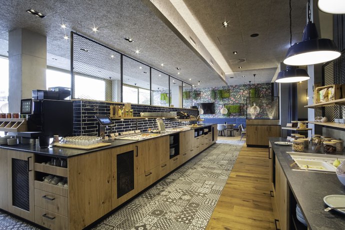 Imagen del bar/restaurante del RiKu HOTEL Reutlingen. Foto 5