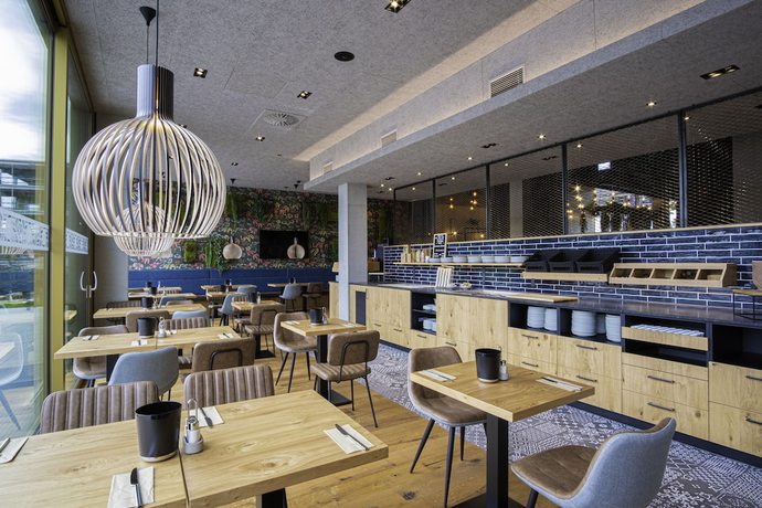 Imagen del bar/restaurante del RiKu HOTEL Reutlingen. Foto 10