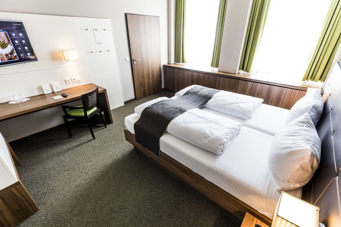 Imagen de la habitación del RiKu HOTEL Weissenhorn. Foto 10