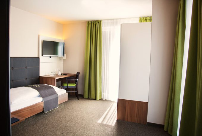 Imagen de la habitación del RiKu HOTEL Weissenhorn. Foto 11