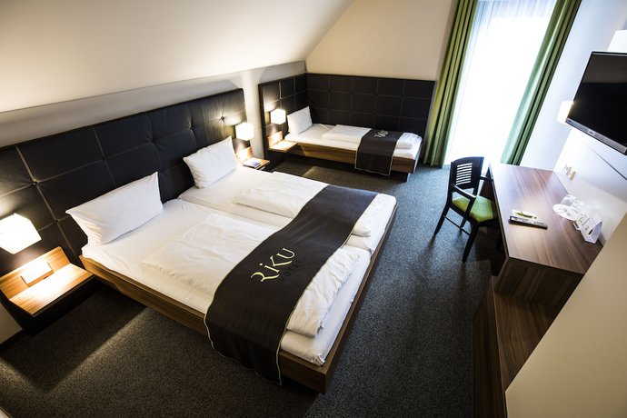 Imagen de la habitación del RiKu HOTEL Weissenhorn. Foto 14