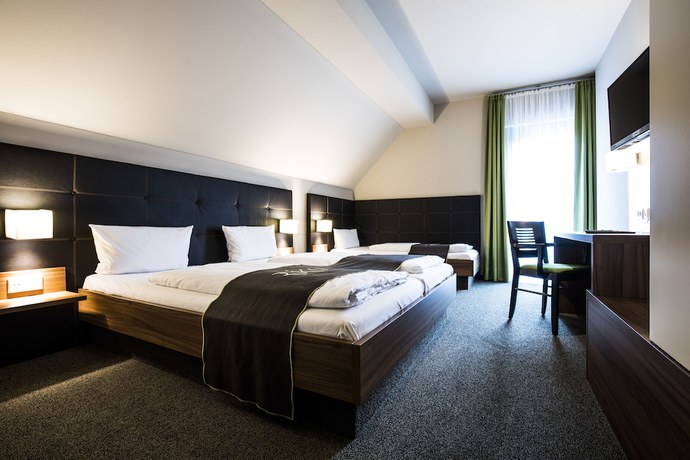Imagen de la habitación del RiKu HOTEL Weissenhorn. Foto 15