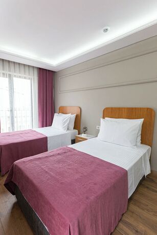 Imagen de la habitación del Ria Suites Hotel. Foto 16