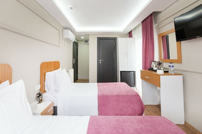 Imagen de la habitación del Ria Suites Hotel. Foto 19