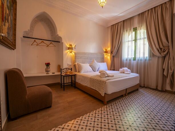 Imagen de la habitación del Riad Dar Sido. Foto 11