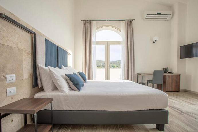 Imagen de la habitación del Riva Toscana Golf Resort and SPA. Foto 3