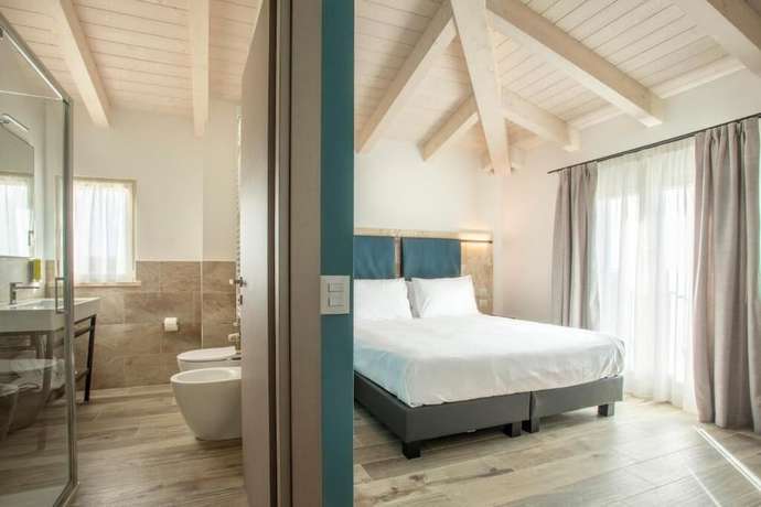 Imagen de la habitación del Riva Toscana Golf Resort and SPA. Foto 6