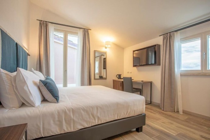 Imagen de la habitación del Riva Toscana Golf Resort and SPA. Foto 10