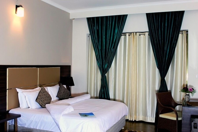 Imagen de la habitación del Riverarch Greenfields Resort. Foto 6