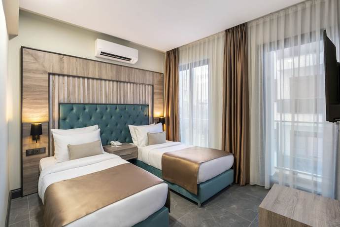 Imagen de la habitación del Rodinn Park Hotel. Foto 2