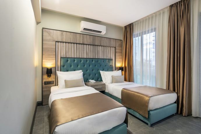 Imagen de la habitación del Rodinn Park Hotel. Foto 7