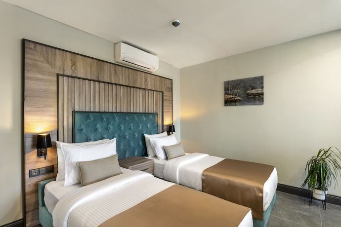 Imagen de la habitación del Rodinn Park Hotel. Foto 9