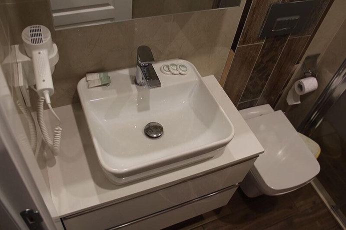 Imagen de la habitación del Rolex Hotel. Foto 14