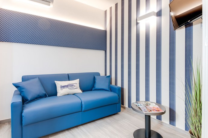 Imagen de la habitación del Romagna Suite Hotel. Foto 13