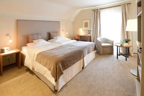 Imagen de la habitación del Romantik Hotel Jagdhaus Waldfrieden. Foto 9