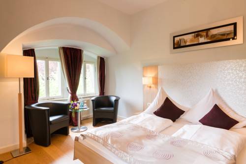 Imagen de la habitación del Romantik Hotel Schloss Hohenstein. Foto 8