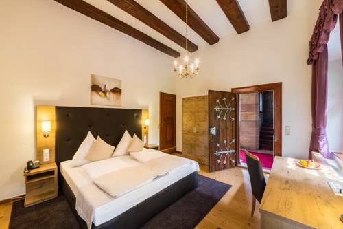 Imagen de la habitación del Romantik Hotel Schloss Hohenstein. Foto 10