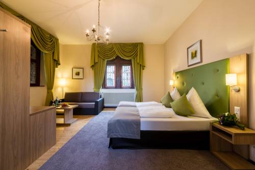 Imagen de la habitación del Romantik Hotel Schloss Hohenstein. Foto 12