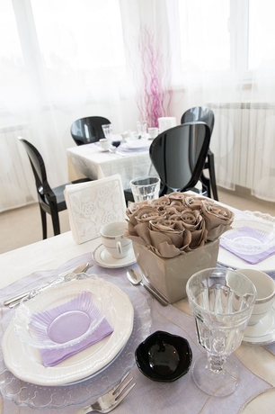 Imagen del bar/restaurante del Rome y Suites. Foto 4