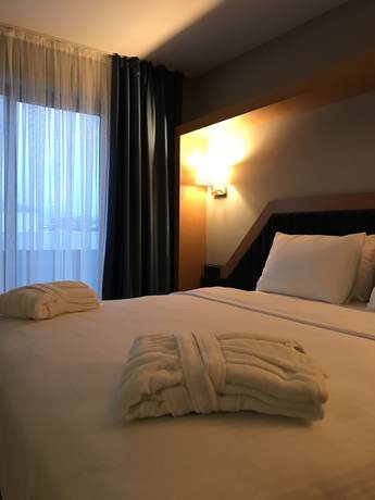 Imagen de la habitación del Roof 264 Hotel and Suites. Foto 12