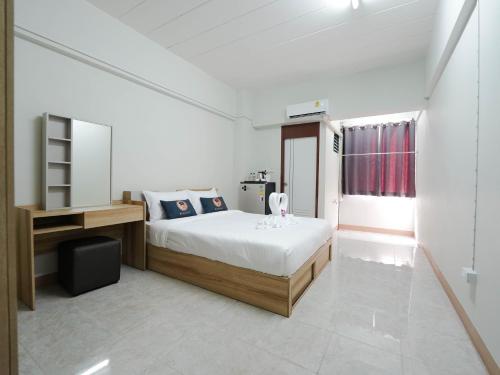 Imagen de la habitación del RoomQuest SPS Hotel and Residence. Foto 20