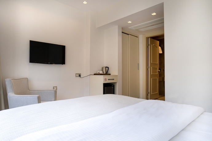 Imagen de la habitación del Rooms365. Foto 13