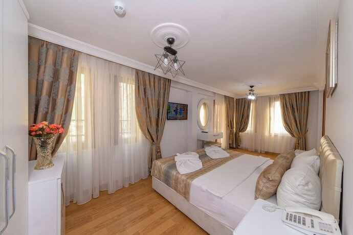 Imagen de la habitación del Rosalie Palace. Foto 15