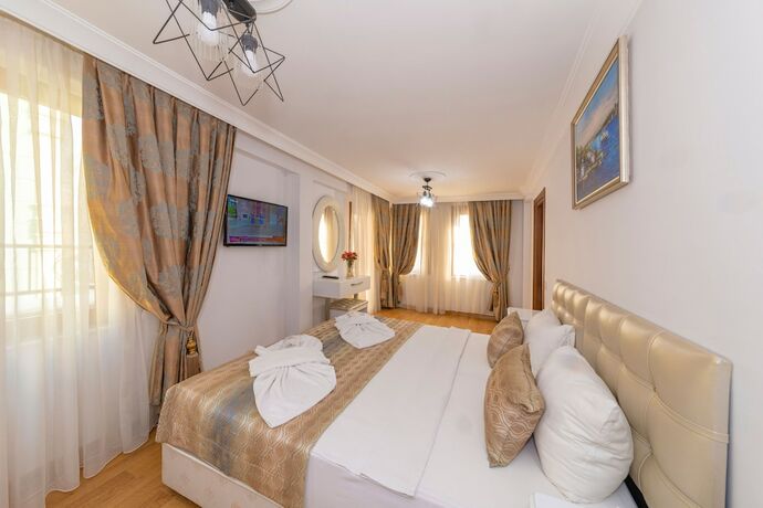Imagen de la habitación del Rosalie Palace. Foto 17