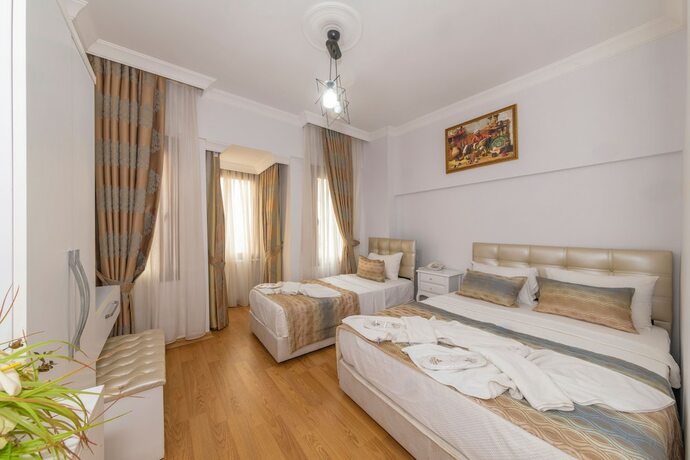 Imagen de la habitación del Rosalie Palace. Foto 20