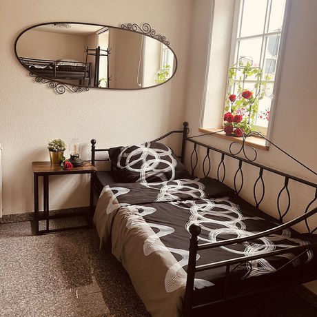 Imagen de la habitación del Rose Boardinghouse. Foto 9
