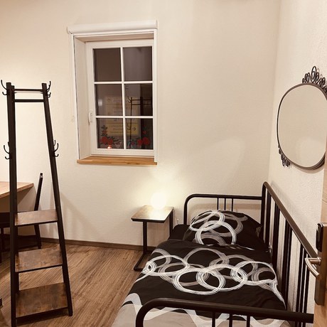 Imagen de la habitación del Rose Boardinghouse. Foto 14