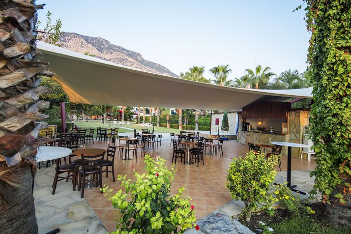 Imagen del bar/restaurante del Rose Garden Boutique Hotel. Foto 10