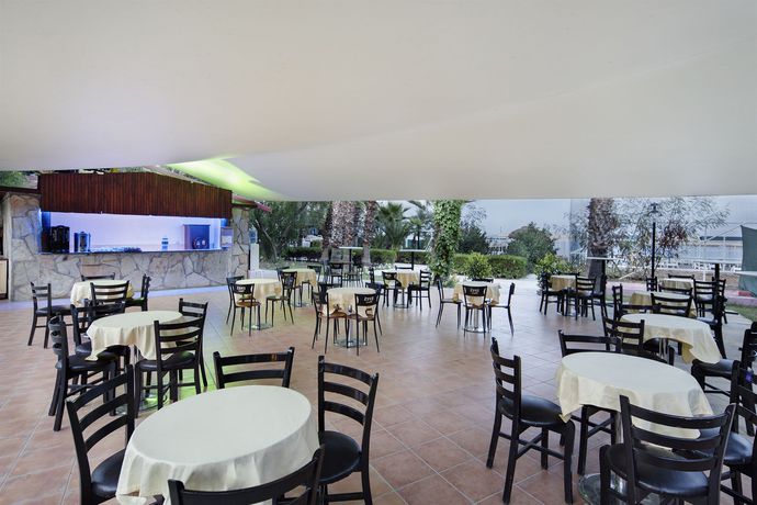 Imagen del bar/restaurante del Rose Garden Boutique Hotel. Foto 11