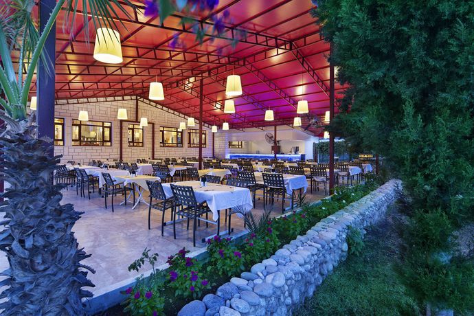 Imagen del bar/restaurante del Rose Garden Boutique Hotel. Foto 12