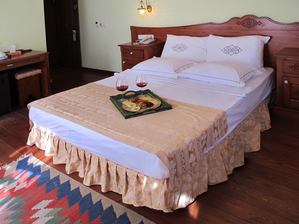 Imagen de la habitación del Rose Garden Suites. Foto 7