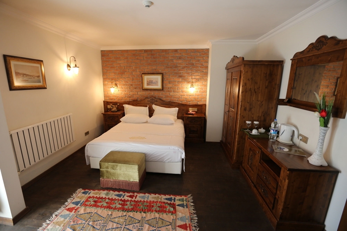 Imagen de la habitación del Rose Garden Suites. Foto 8