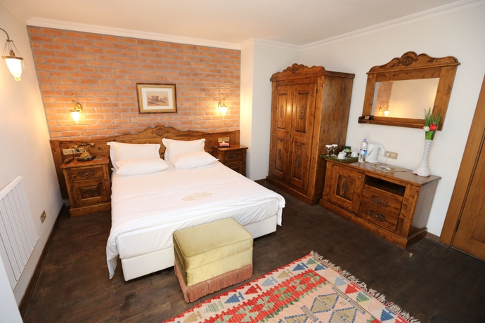 Imagen de la habitación del Rose Garden Suites. Foto 10