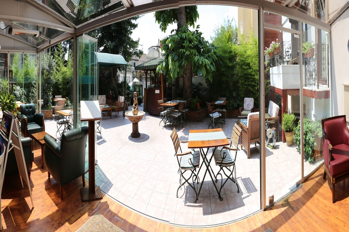 Imagen de los exteriores del Rose Garden Suites. Foto 14