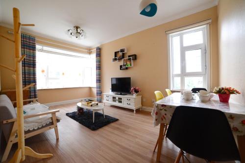 Imagen de la habitación del Rosy Town Holiday Apartment Changbai Mountain Beiw. Foto 7