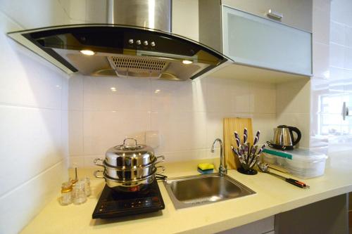 Imagen de la habitación del Rosy Town Holiday Apartment Changbai Mountain Ming. Foto 6