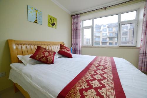 Imagen de la habitación del Rosy Town Holiday Apartment Changbai Mountain Ming. Foto 10