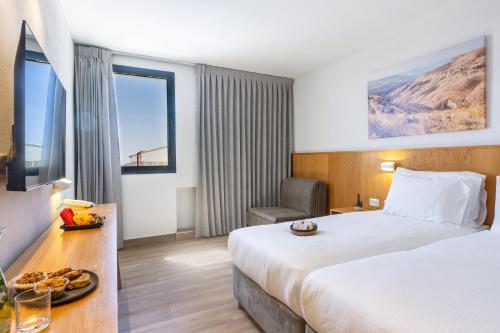 Imagen de la habitación del Roxon Desert Arad. Foto 16