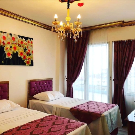 Imagen de la habitación del Royal Babil Suites. Foto 6