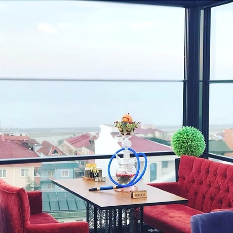 Imagen del bar/restaurante del Royal Babil Suites. Foto 5